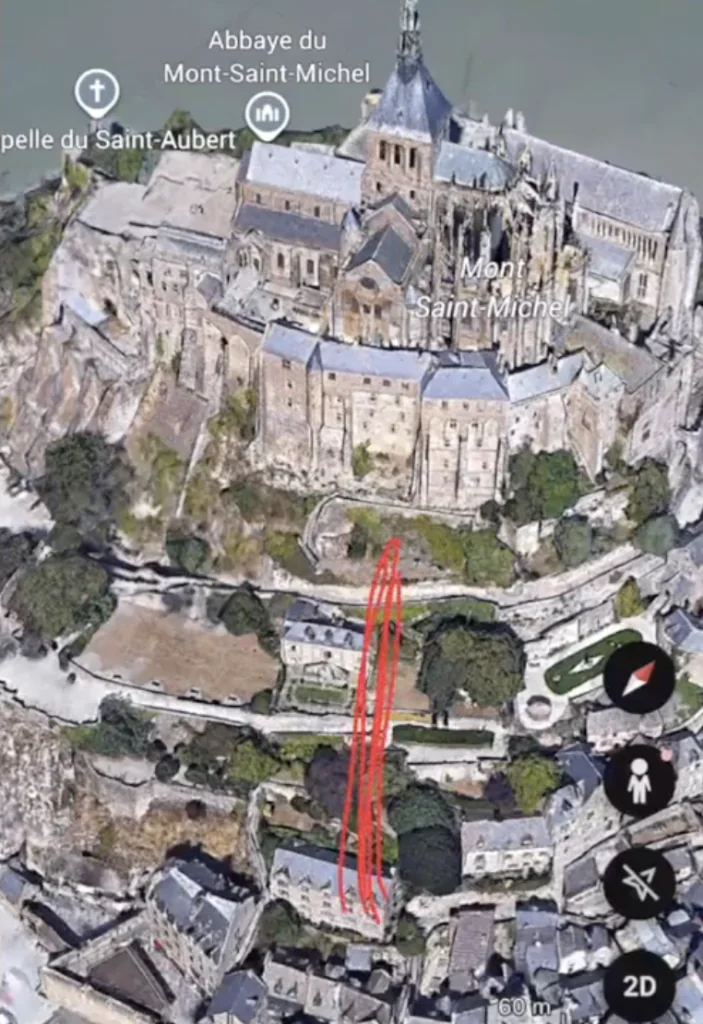 vue Google Earth du Mont Saint Michel avec tracé de trajectoire caméra illustrant la transformation en vidéo drone par IA